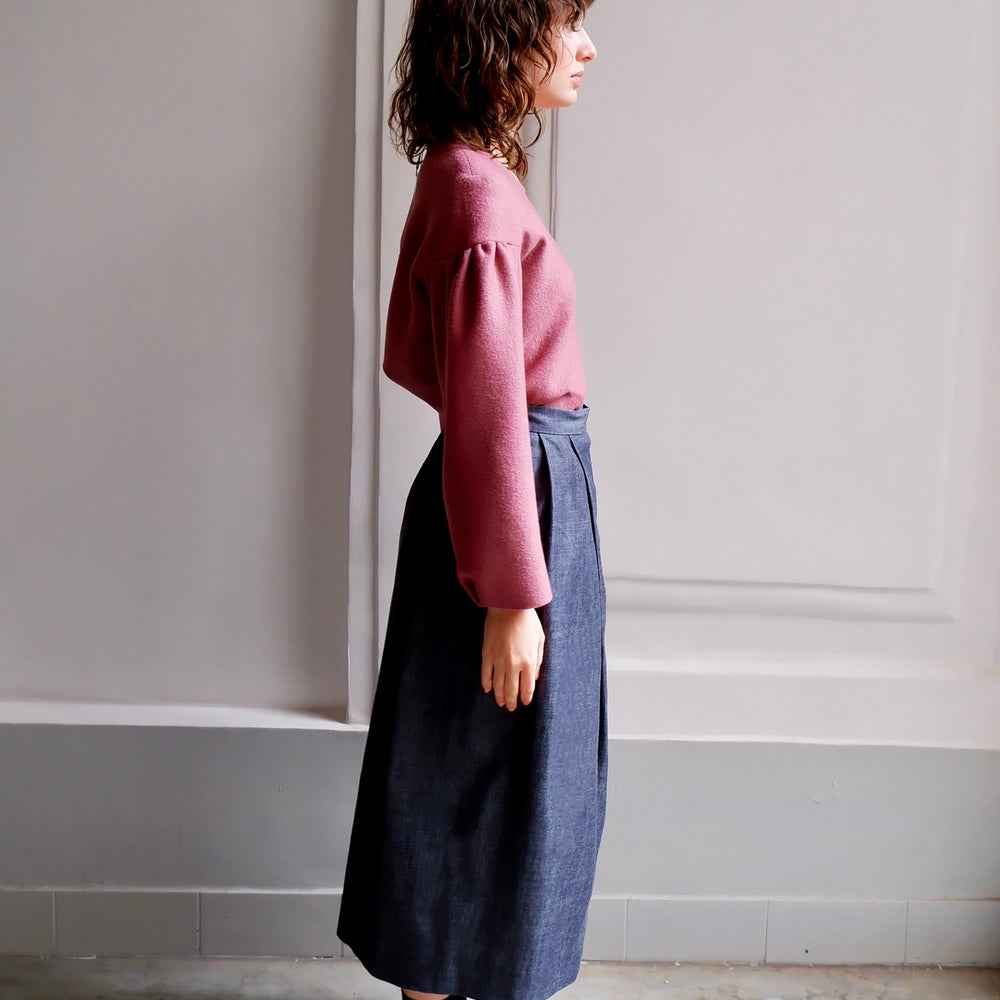 
                      
                        ALAIA DARK DENIM SKIRT
                      
                    