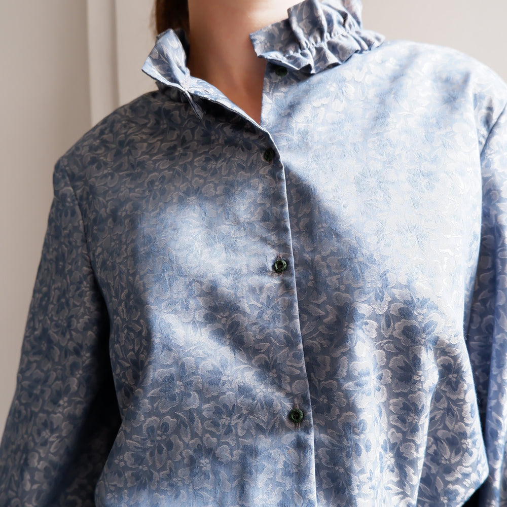 
                      
                        ISABELLA BLUE JACQUARD BLOUSE
                      
                    