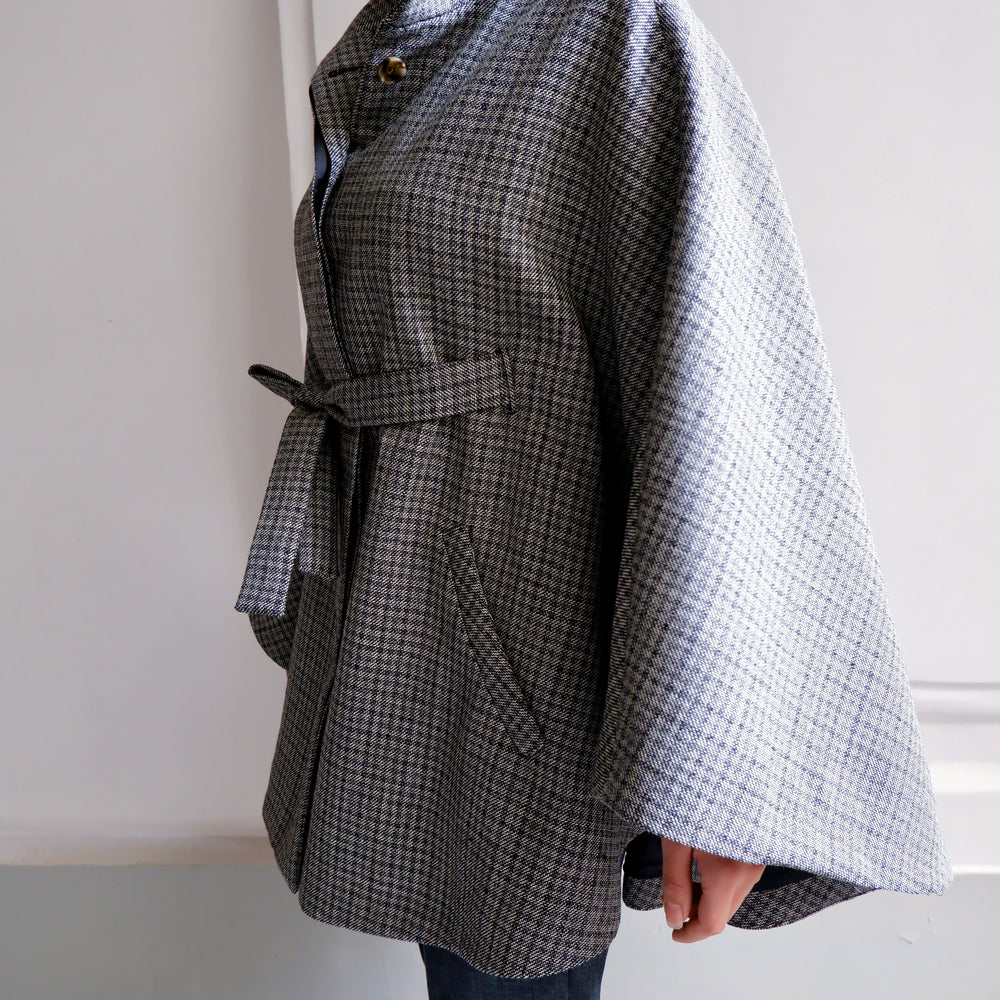 
                      
                        ANGELE WOOL BLEND JACQUARD CAPE (Black and White)
                      
                    