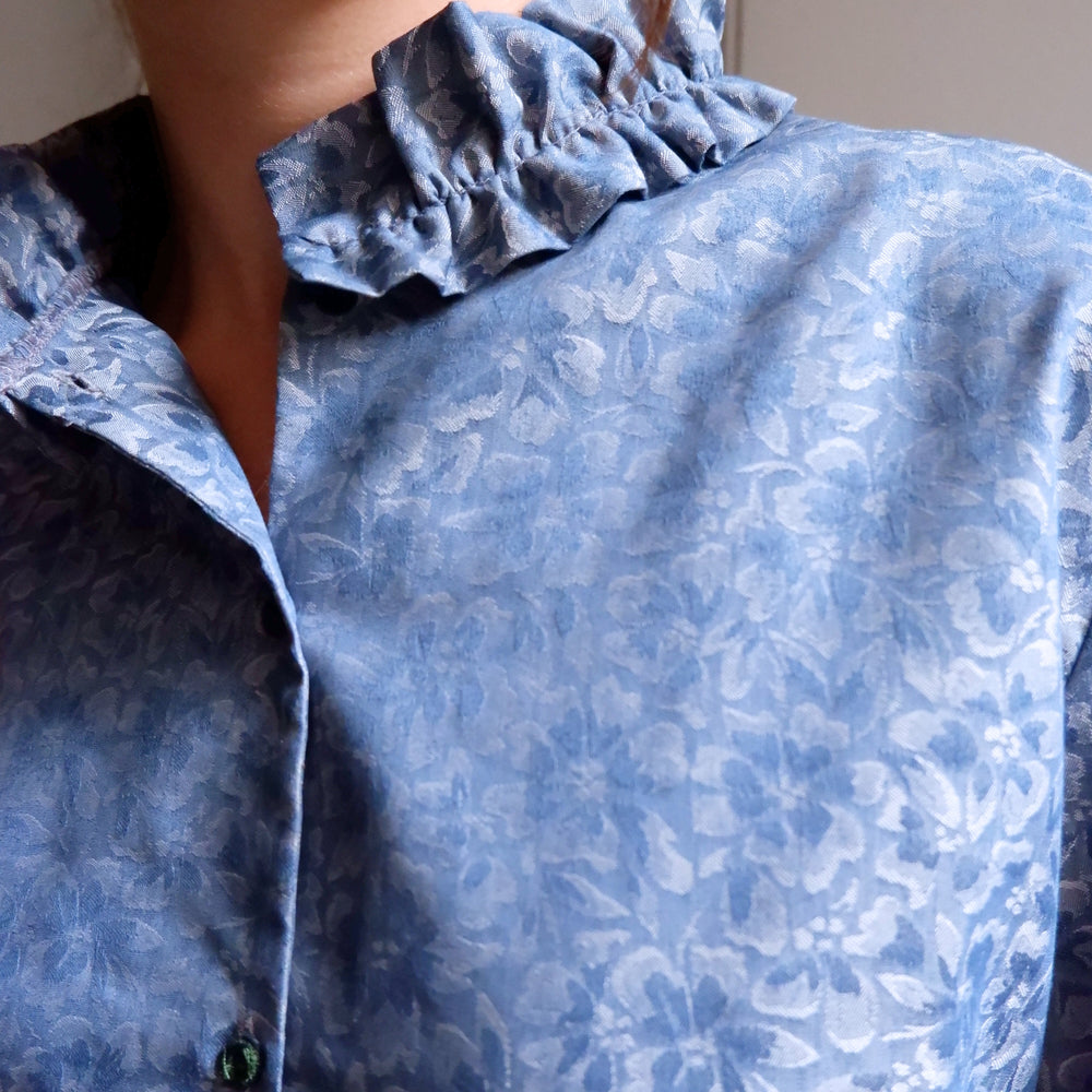 
                      
                        ISABELLA BLUE JACQUARD BLOUSE
                      
                    