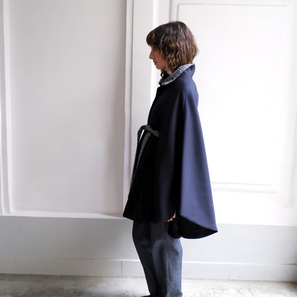 
                      
                        ANGELE NAVY TWEED CAPE
                      
                    