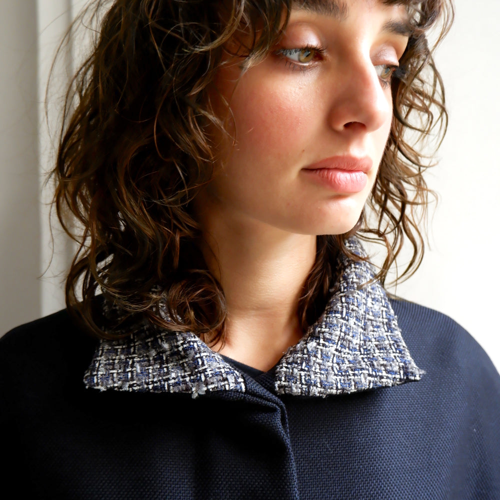 
                      
                        ANGELE NAVY TWEED CAPE
                      
                    