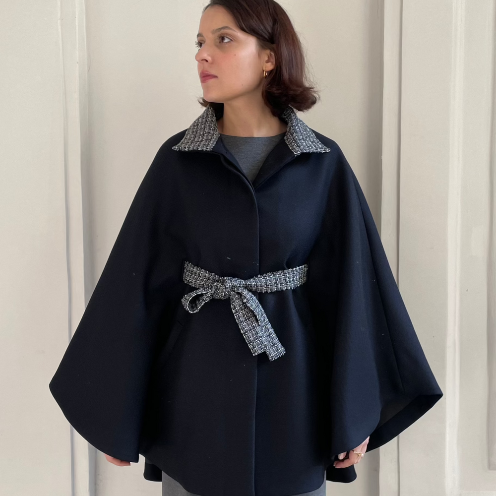 
                      
                        ANGELE NAVY TWEED CAPE
                      
                    