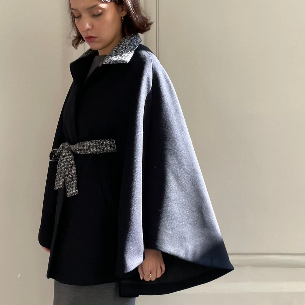 
                      
                        ANGELE NAVY TWEED CAPE
                      
                    