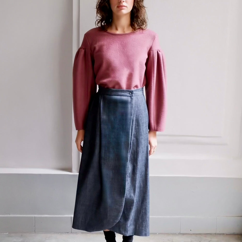 
                      
                        ALAIA DARK DENIM SKIRT
                      
                    